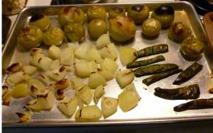 Broiled Tomatillos, Serranos, Onions and Garlic on a Baking Sheet