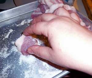 Pork belly slices dredged in salt and sugar mixture